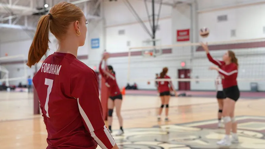 Picture of women's volleyball team warming up
