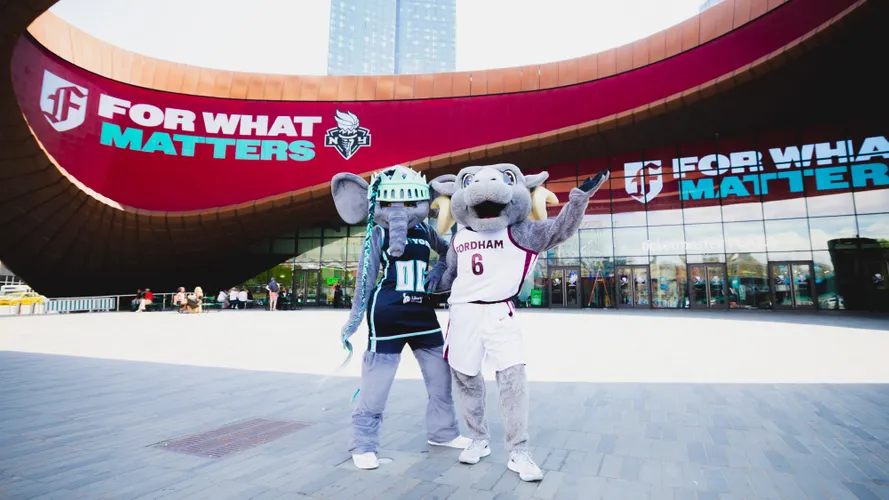 Ramses and Ellie pose in front of the Barclays Center
