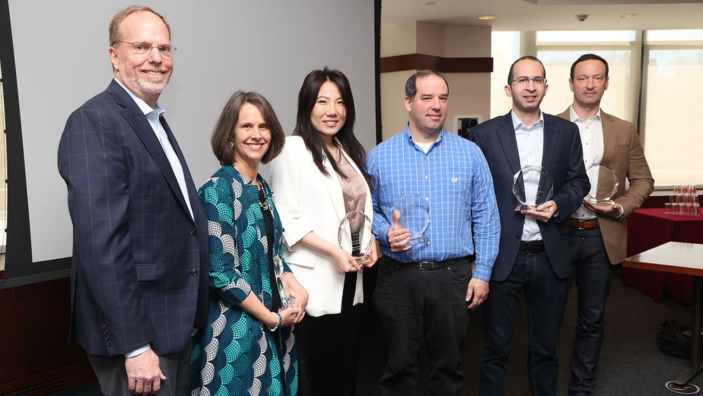 Dennis Jacobs, provost of the University, with Kirsten Swinth, Jie Ren, Christopher Koenigsmann, Mohamed Rahouti, and Marc Conte.