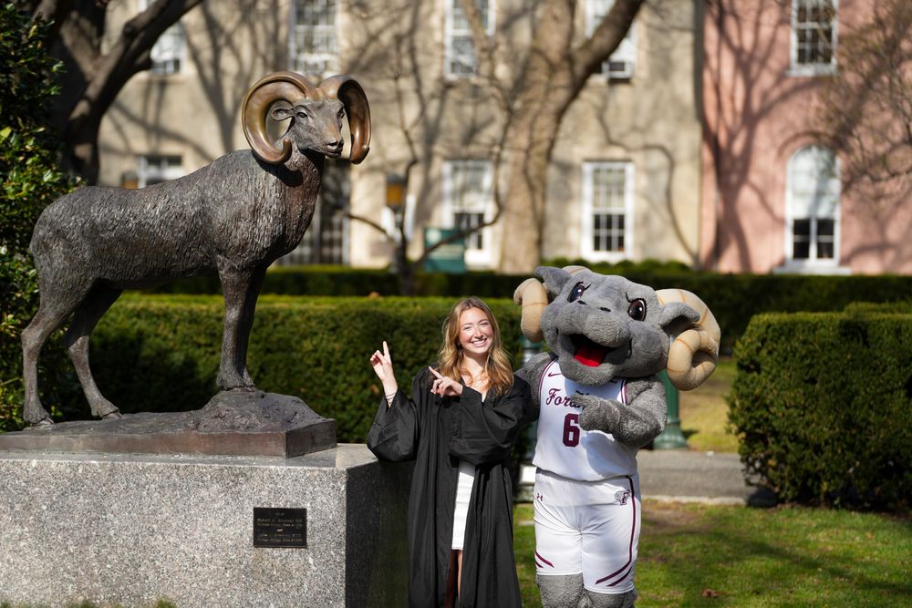 Abby Hartlieb and Ramses pose with the Ram statue