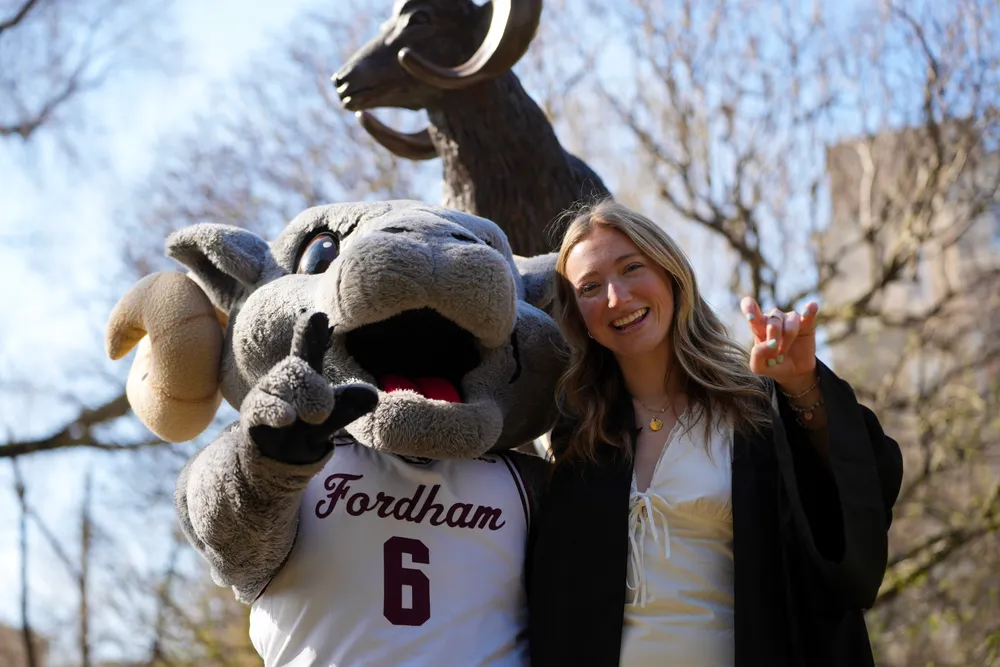 Abby Hartlieb poses with Ramses at the  Ram statue
