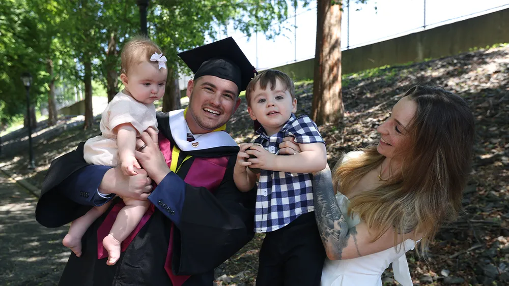 Andrew Hervieux with his family at Commencement