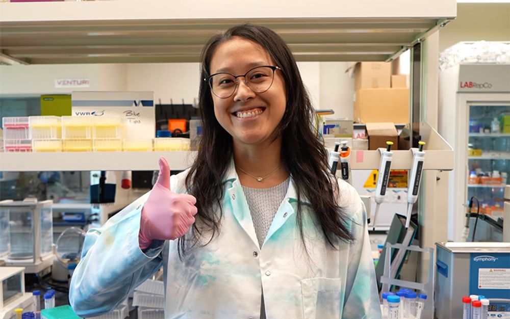 Chemistry student poses in the lab