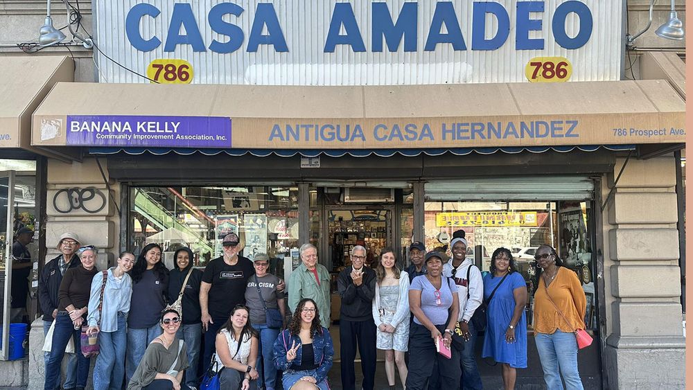 Members of the BAAHP staff visiting the Bronx Music Store Casa Amadeo
