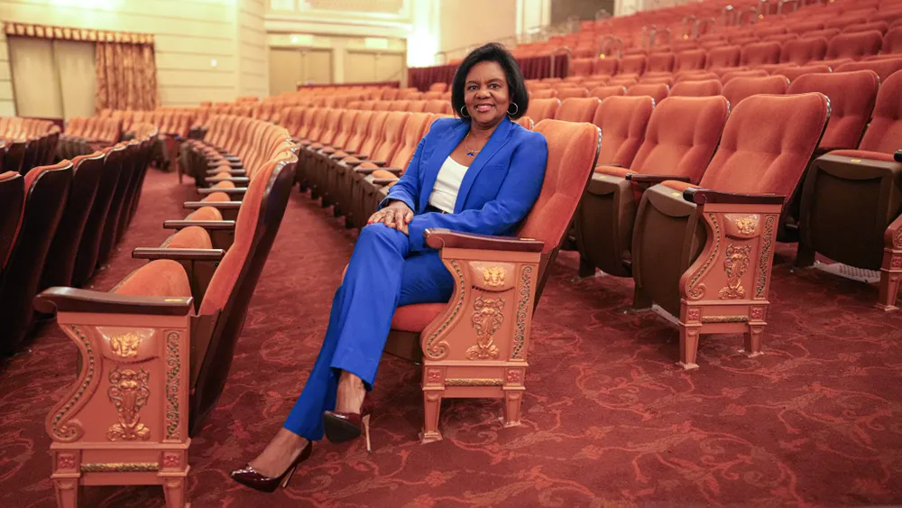 Cherine E. Anderson sitting in a theatre