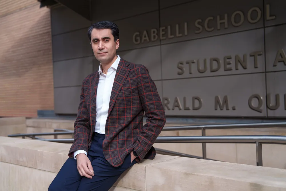 Navid Asgari poses outside the Gabelli School of Business