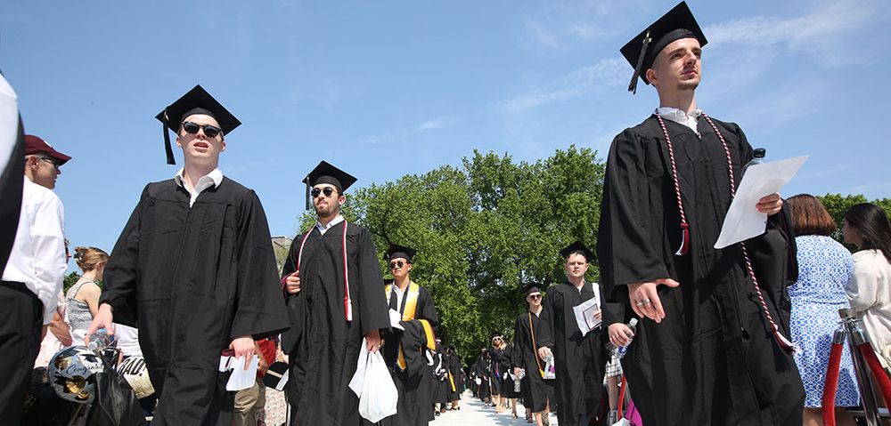 Graduates processing at Rose Hill Campus