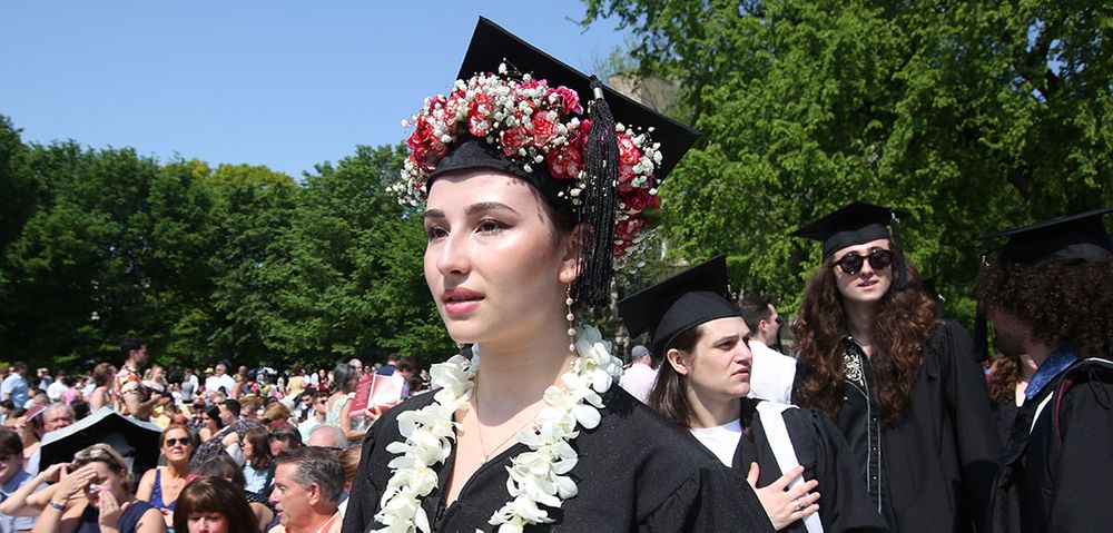 Graduate cap with flowers at the 177th University Commencement