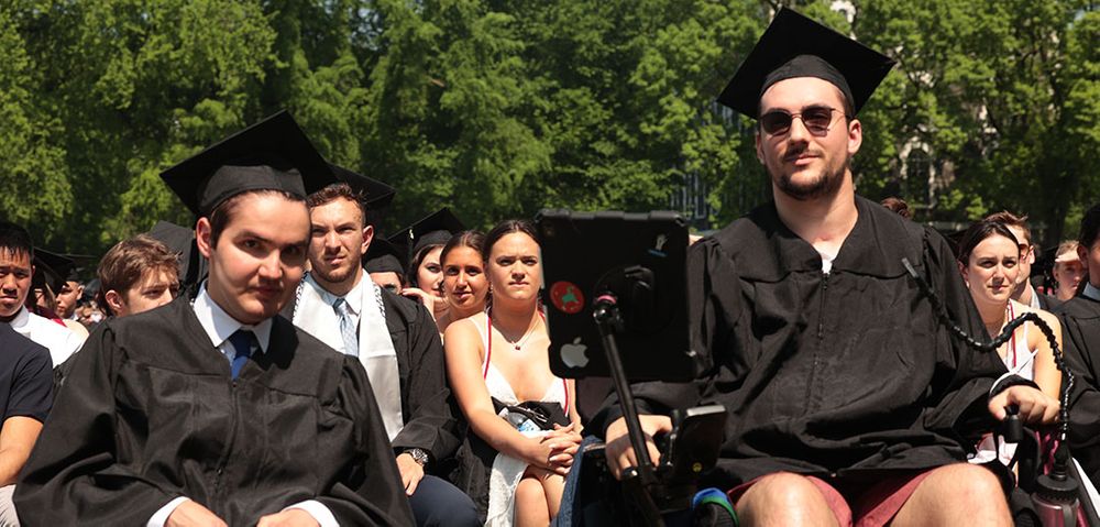 Students attending commencement ceremonies at Rose Hill