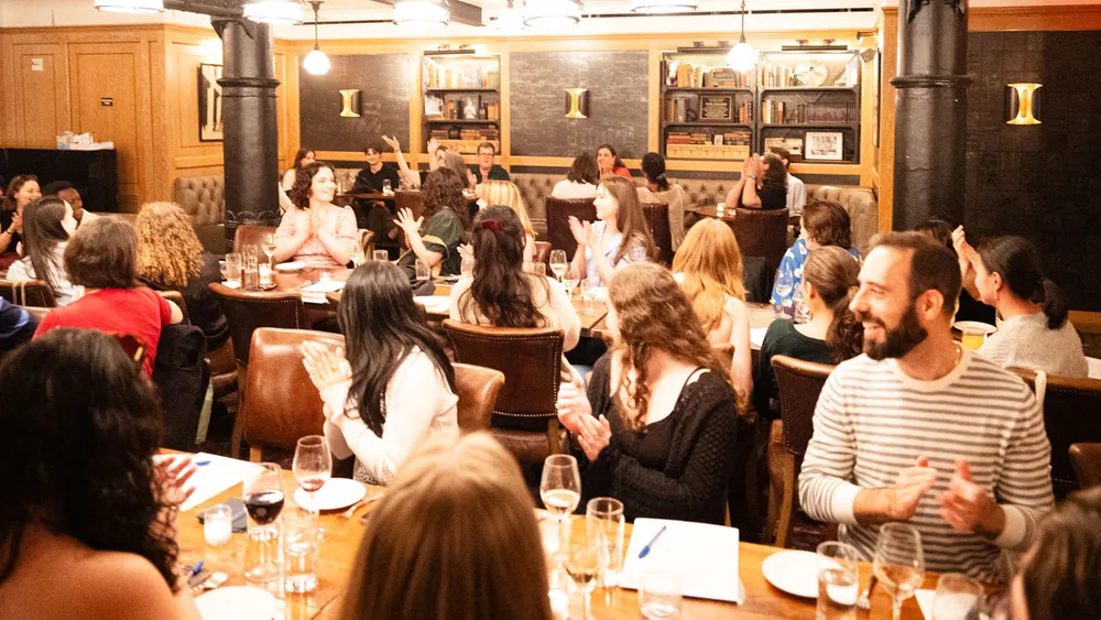 The English Department's Family Meal with students and alumni in 2024.