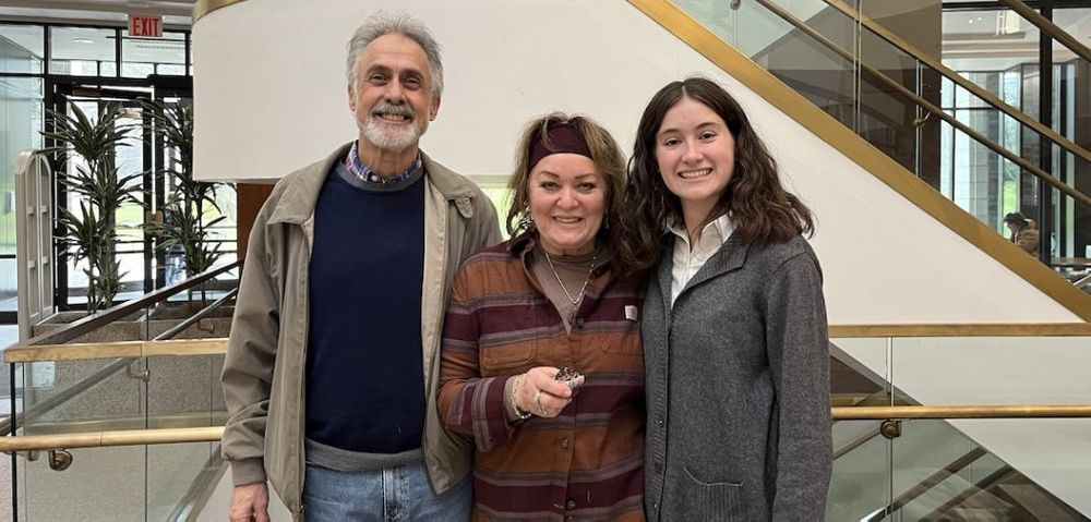 Sophia Maier with two of her many interview subjects-Harold Schultz and Eva Yelloz—in the Walsh Library. Photos courtesy of Maier