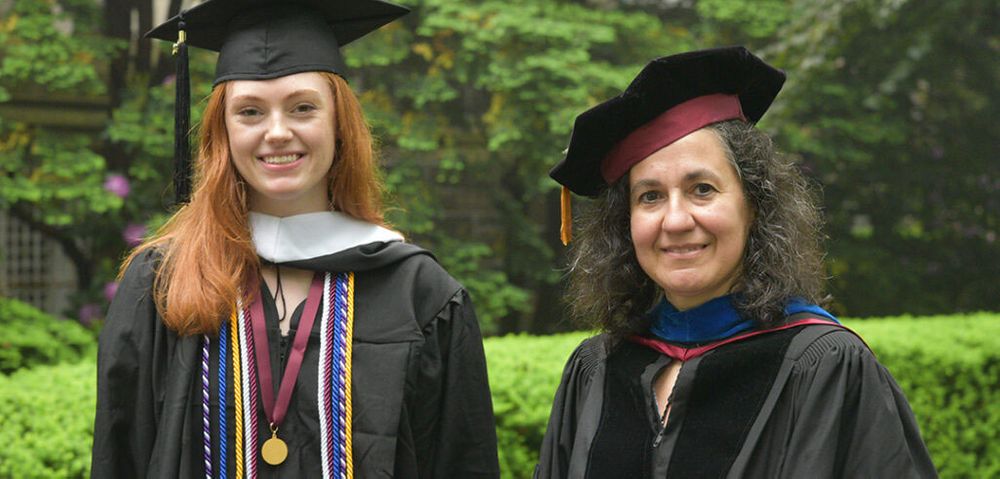 Emily Lewis (left) and her faculty mentor, Sophie Mitra. Photo by Chris Gosier