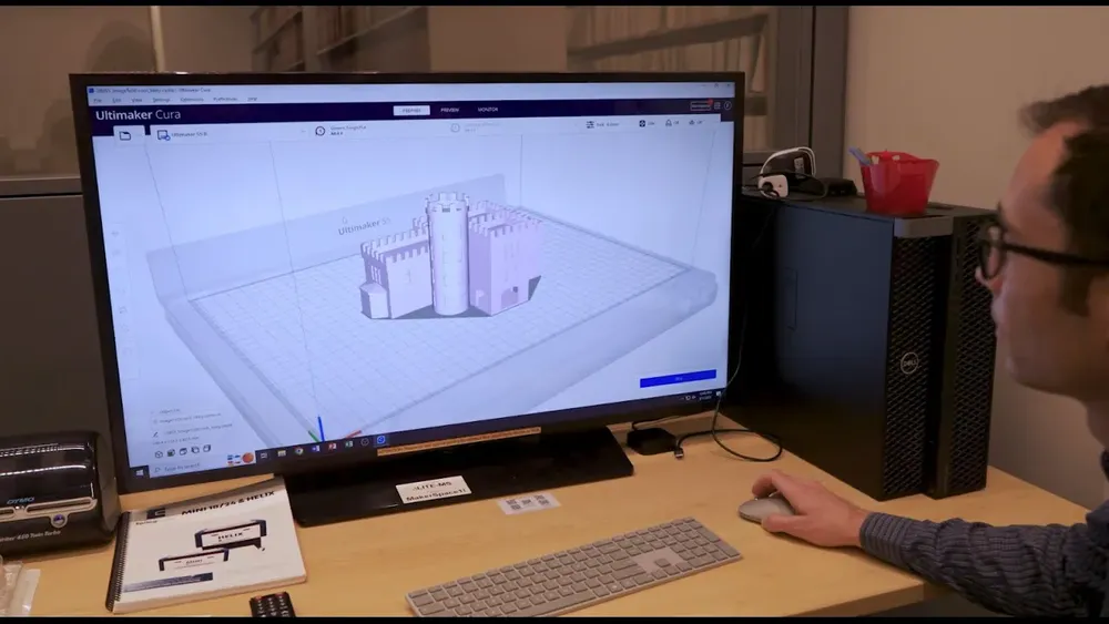 Student designing a castle with a 3D computer program