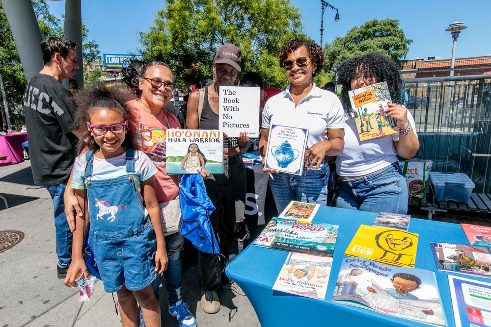 Community members with books