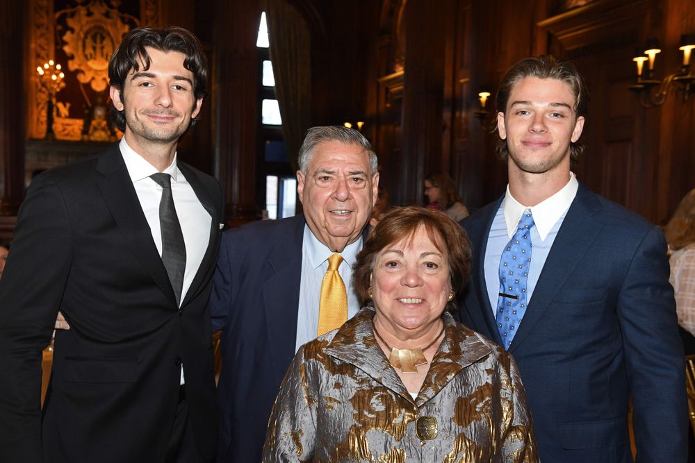 two male students with female and male donors