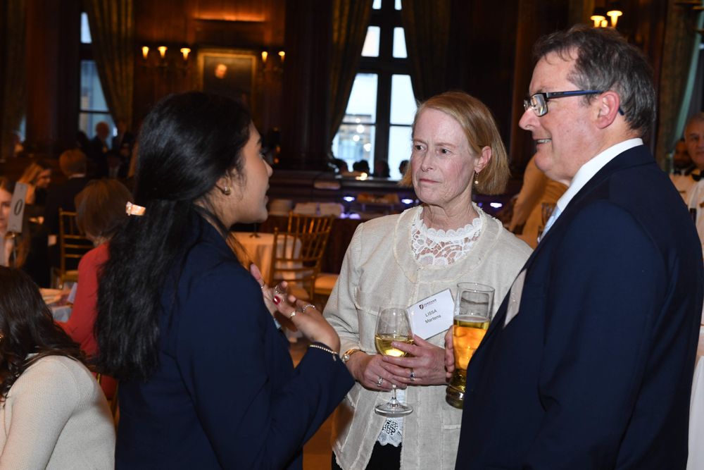 male and female donor speaking with student