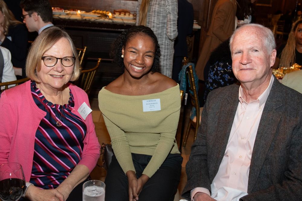 A female and male donor are seated next to a female student at the Scholarship Donors and Recipients Reception
