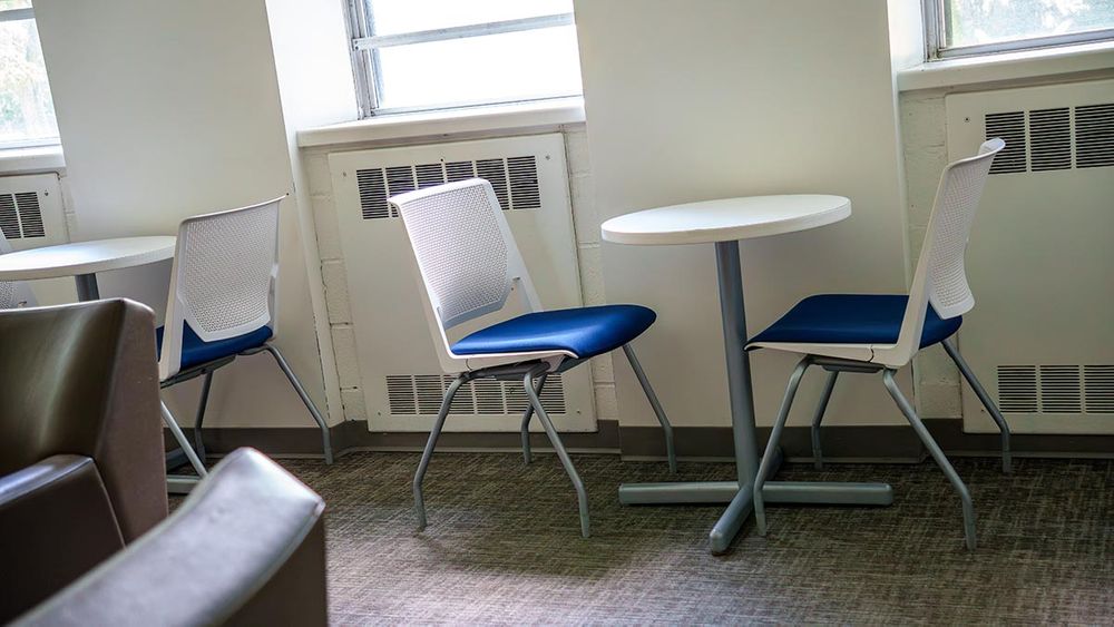 Faber Hall Lounge with table and chairs