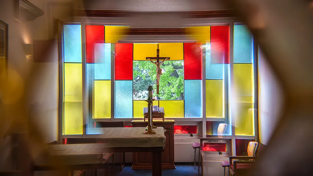 Stained glass and alter within the chapel
