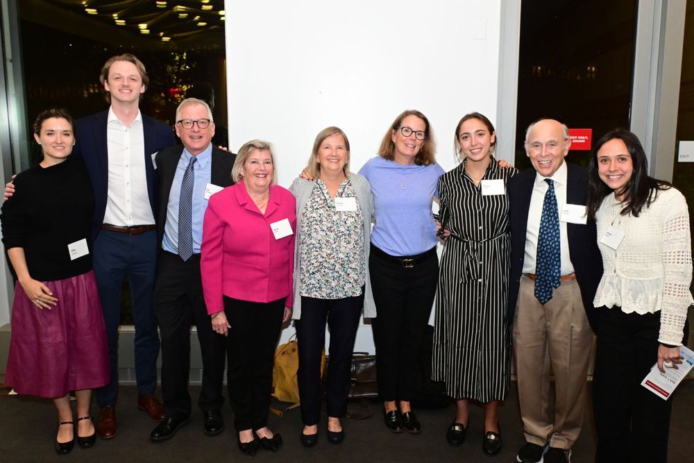 Smiling attendees at Fordham Law Sommer Lecture 2024