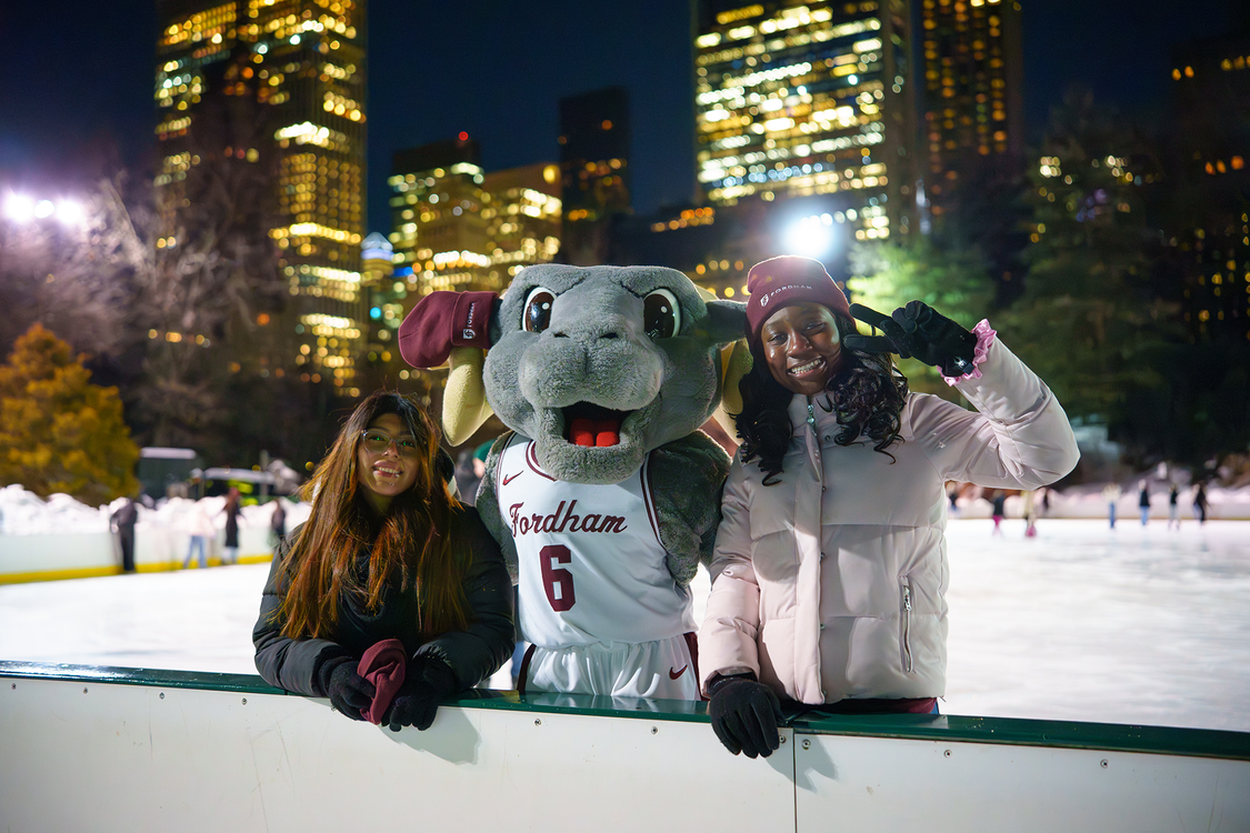 First Year Forward Event Week at Wollman Rink with Fordham Mascot and two First Year students