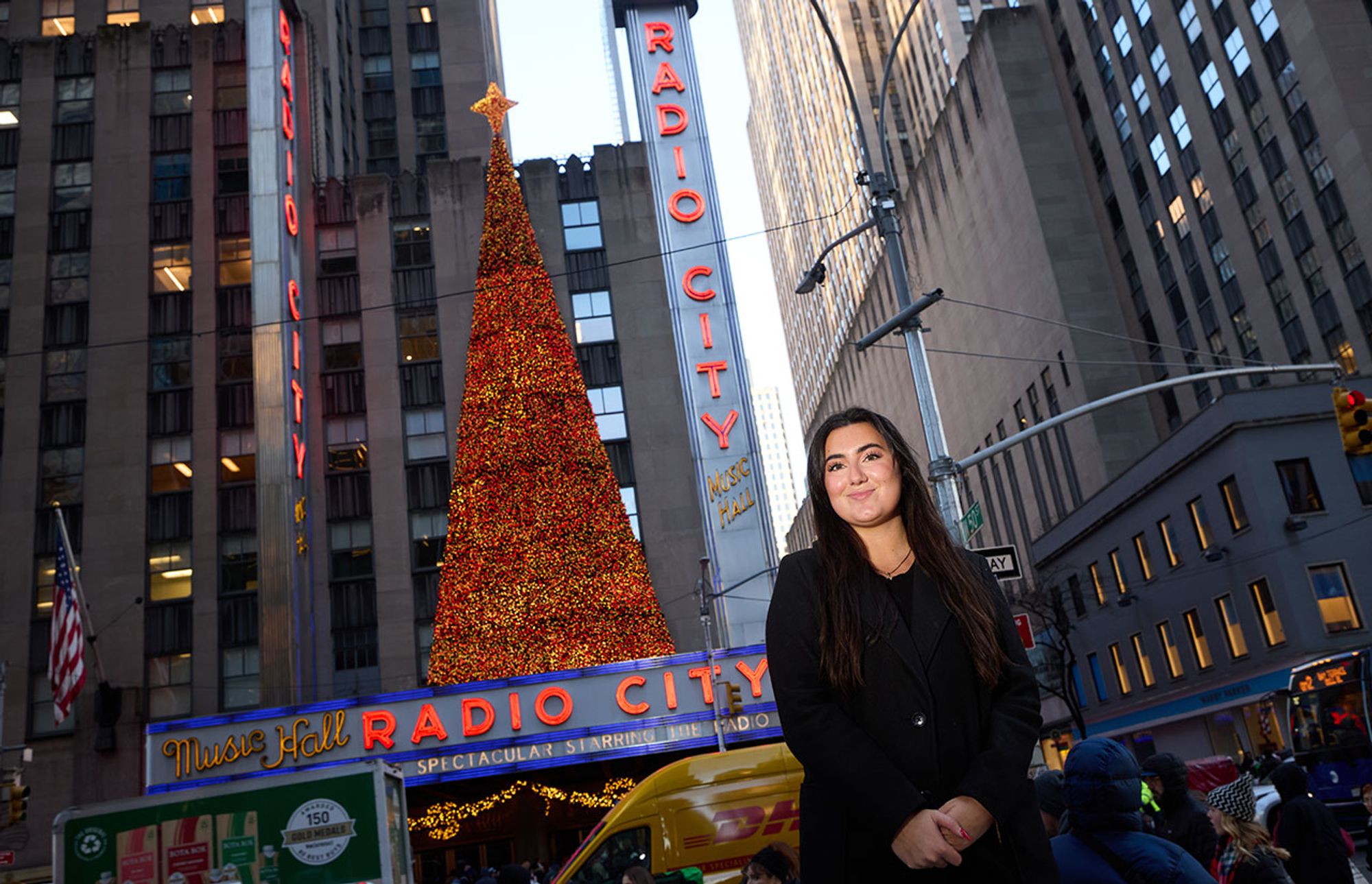 Haley Karinja poses in front of Radio City Music Hall