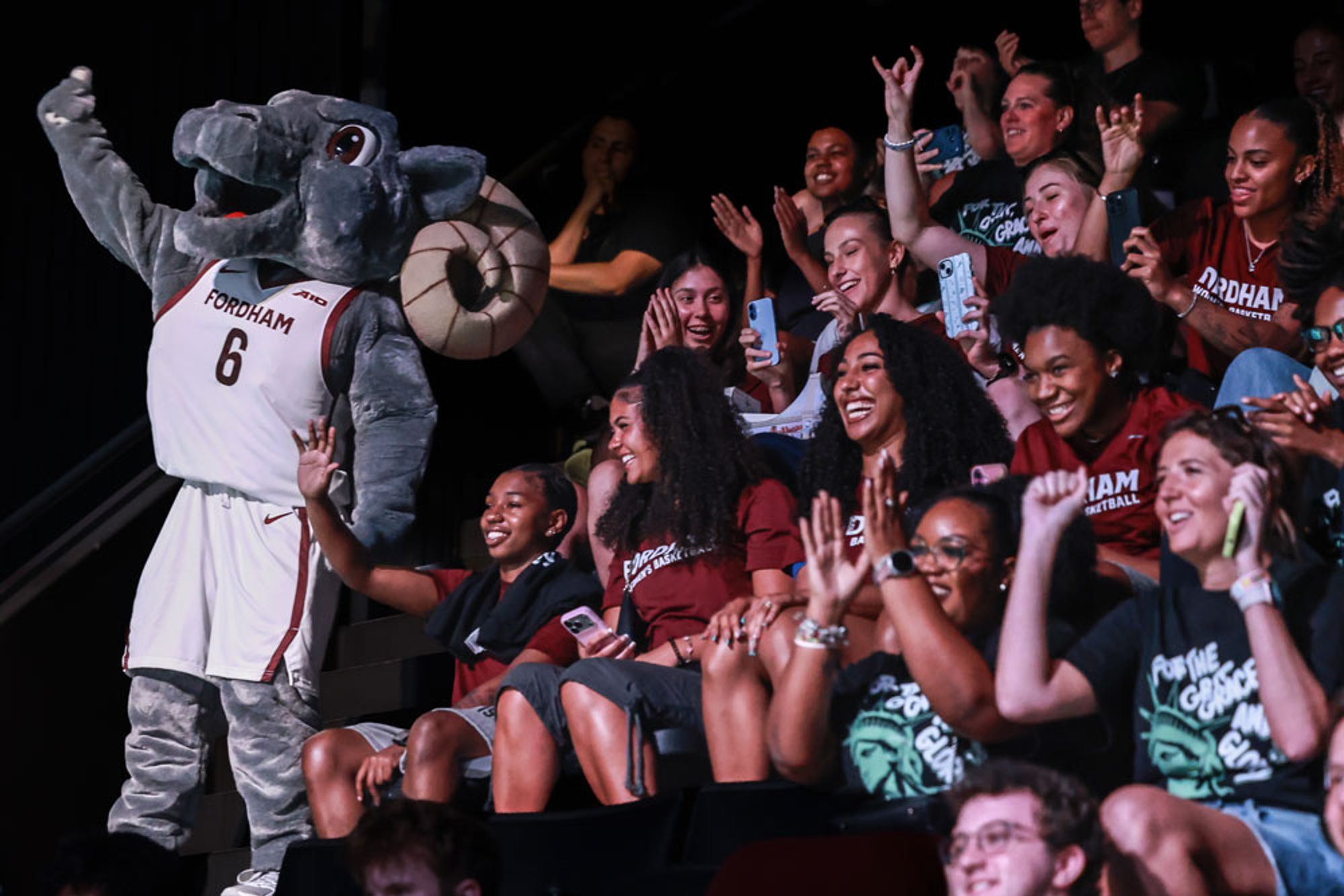Fordham fans cheer on the New York Liberty with Ramses at Barclays Center