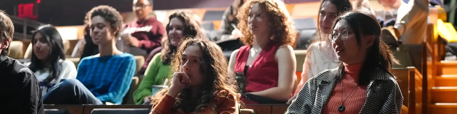 Student in a lecture style classroom