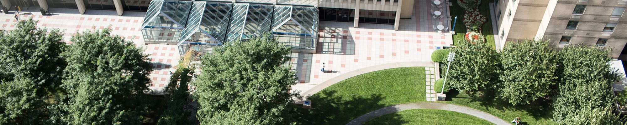 Aerial Image of the Lincoln Center Plaza with Outside Seating and Enclosed Cafe Seating.