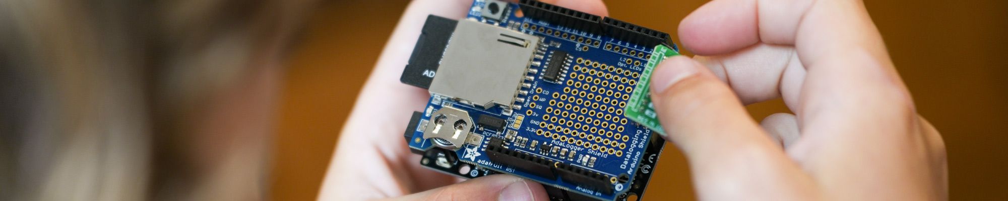 Student with a computer chip