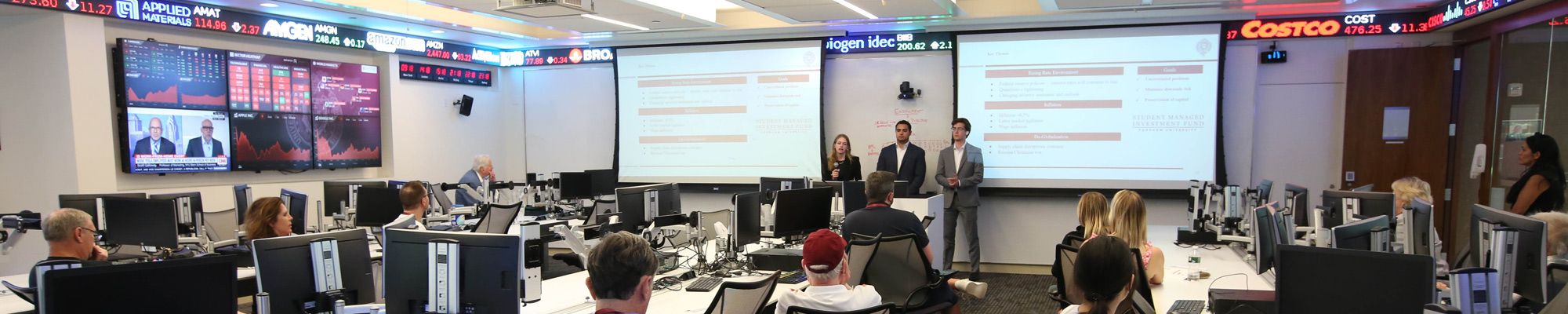 Students presenting to the trading room at Gabelli School of Business