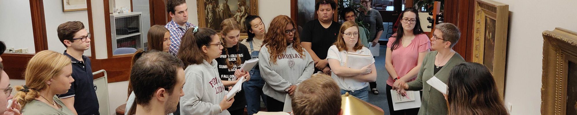 Professor leads a jewish studies class in the library