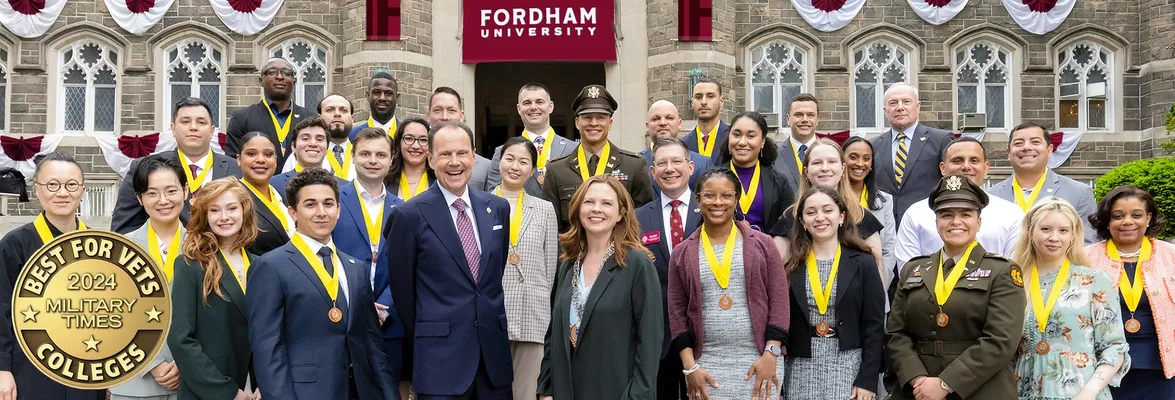 Veterans pose with President Tetlow