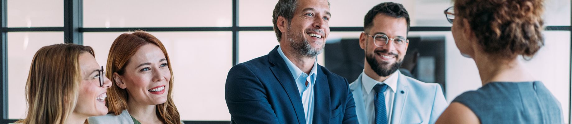 Online Management Students Meeting in Person