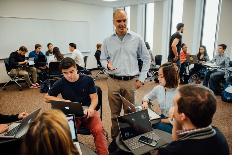 Faculty providing instruction in a classroom at Lincoln Center