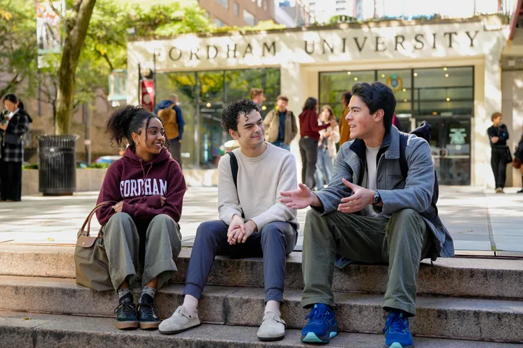 Students sitting on the stairs in front of Lowenstein on the Lincoln Center campus
