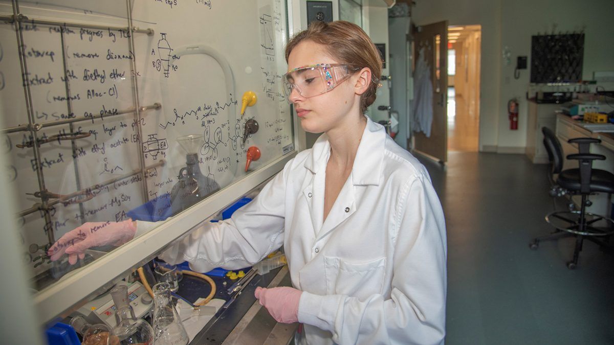 Ashley Clemente in works in a laboratory on campus.