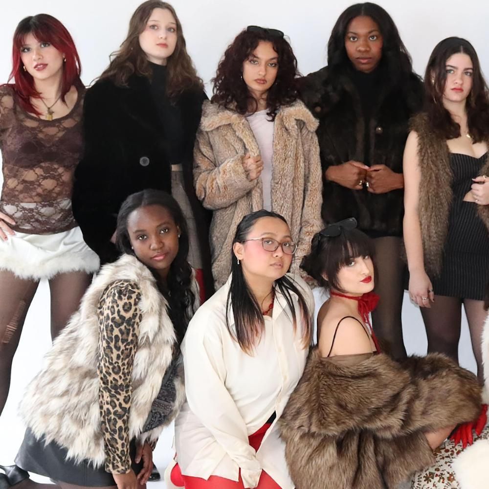 Students in the Fashion for Philanthropy club pose for a photo shoot.