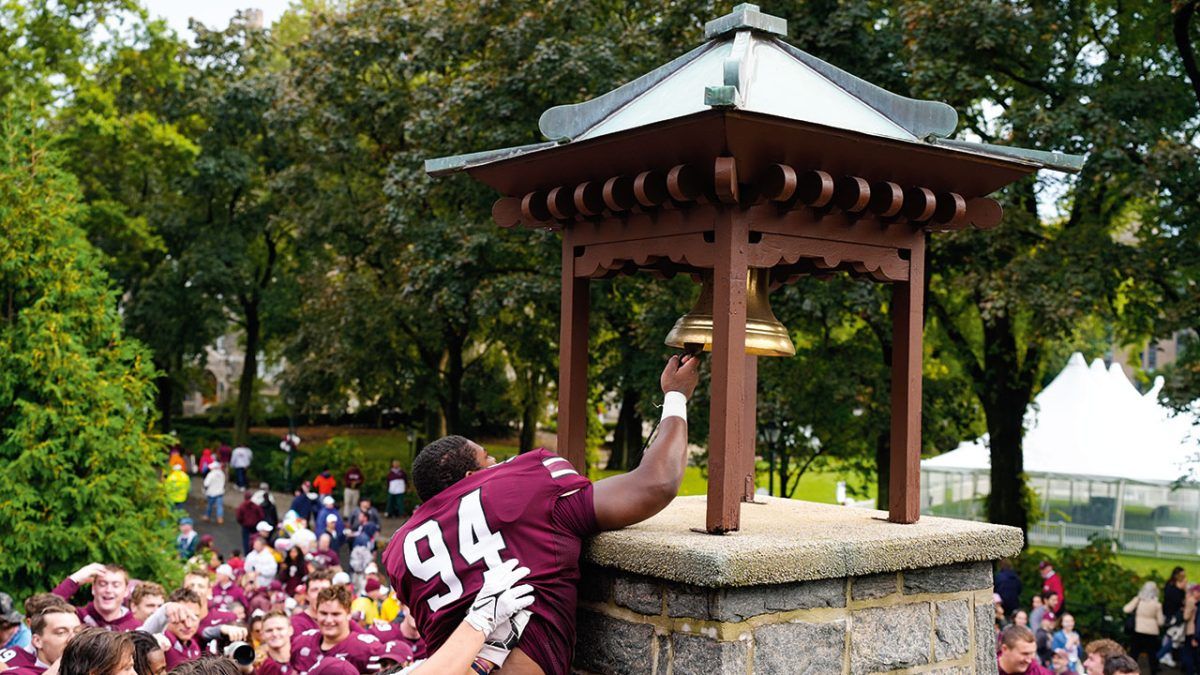 Fordham football player rings the Victory Bell