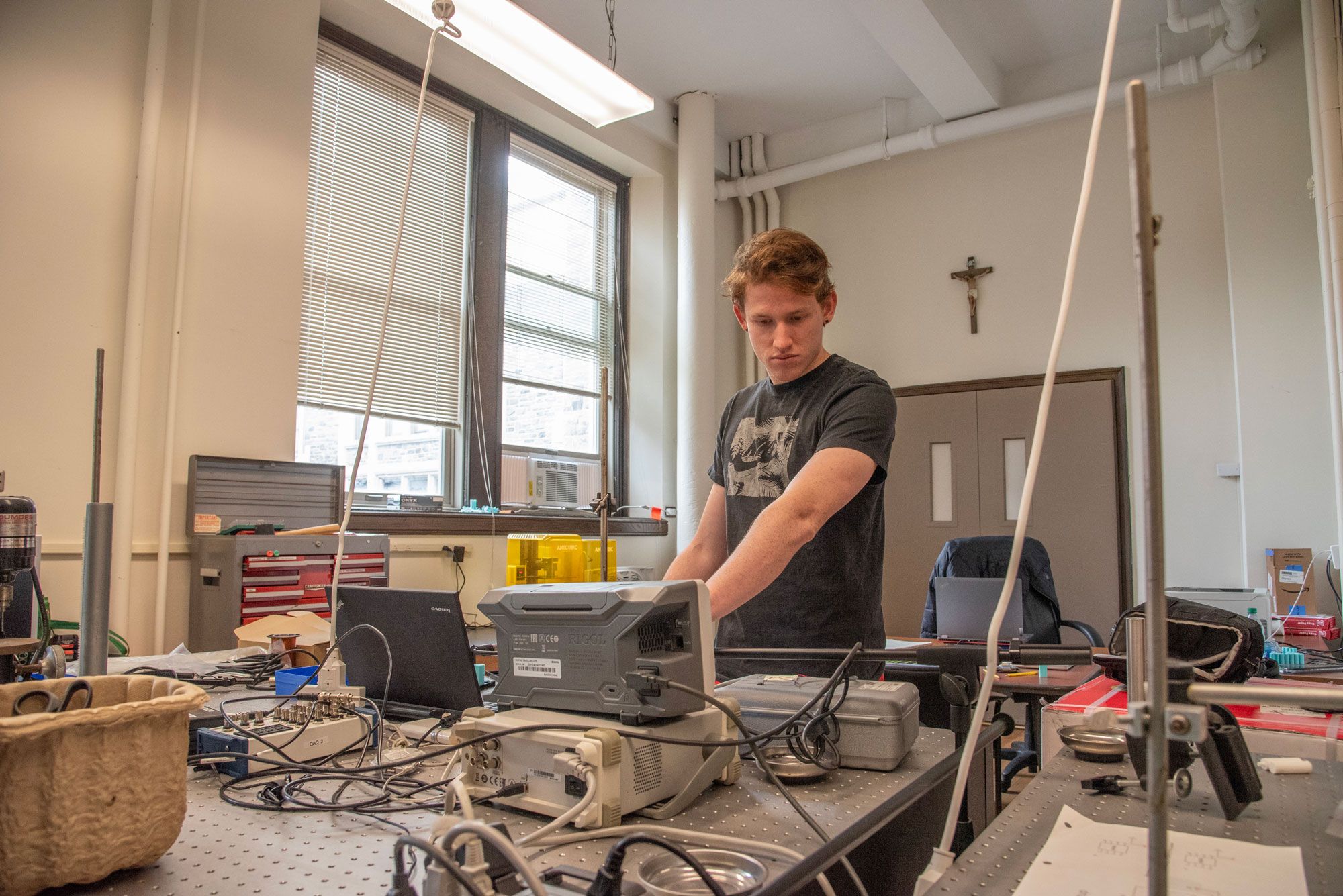 Jackson Saunders working on his acoustics project in a lab at the Rose Hill campus