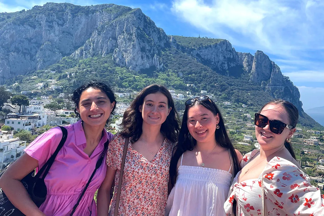 Four females students pose for a picture outside in Grenada Spain