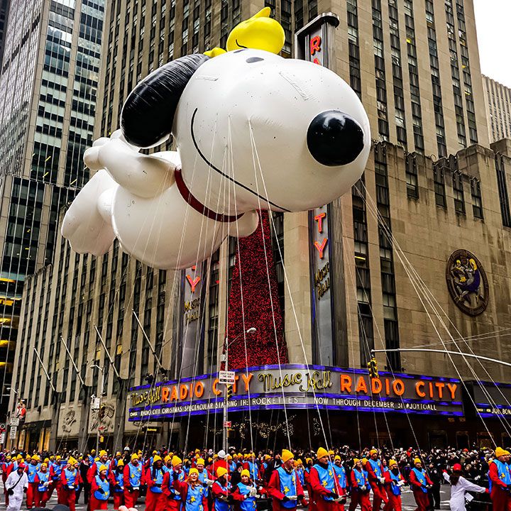 The Snoopy balloon in front of Radio City at the Thanksgiving Parade