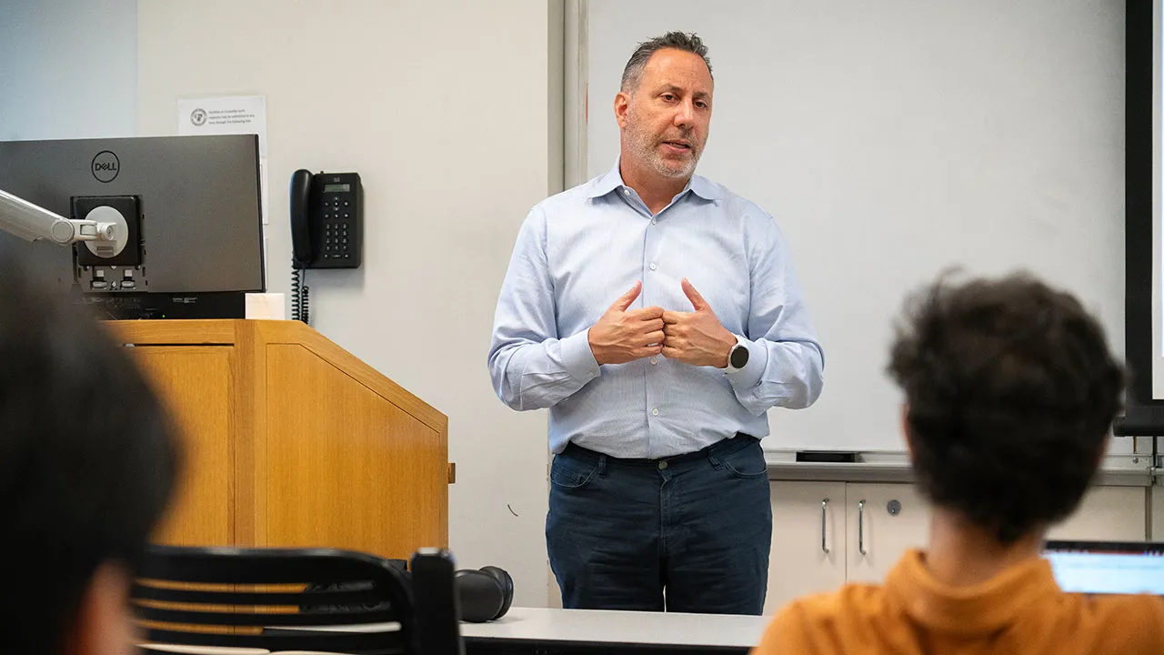Peter Zangari teaching a class on AI and the financial markets at Fordham