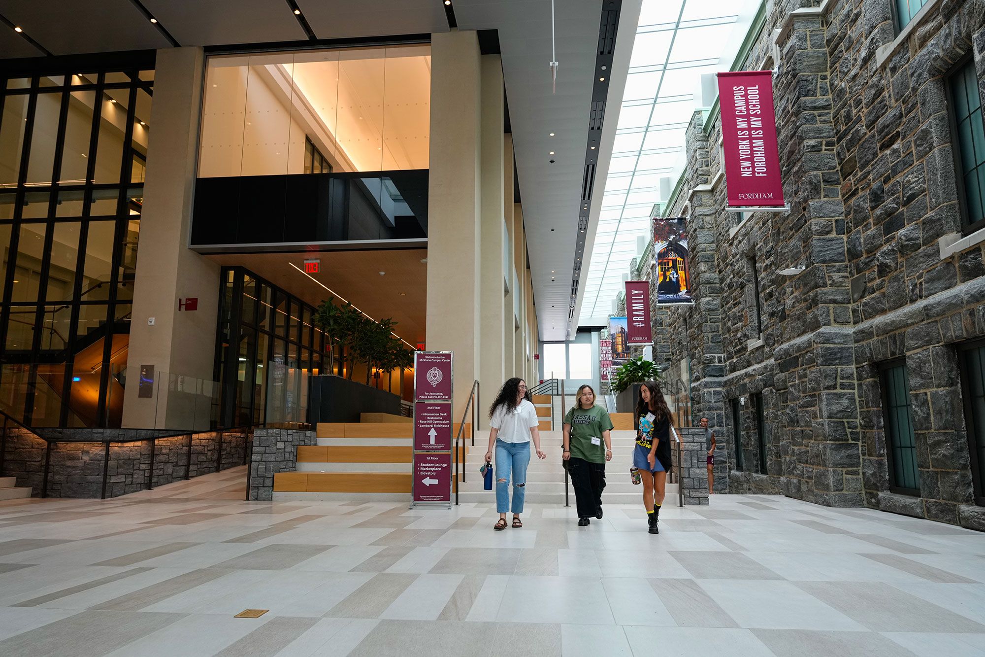 Students walk through the arcade in the McShane Center