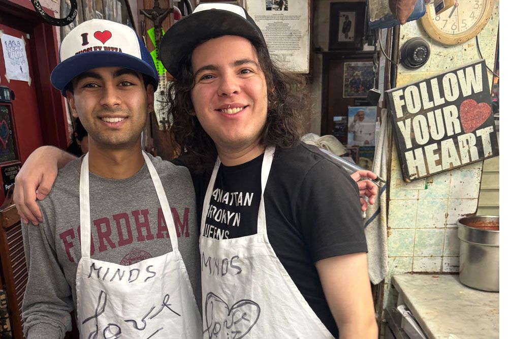 Two MINDS participants pose for a photo at Pugsley's Pizza.