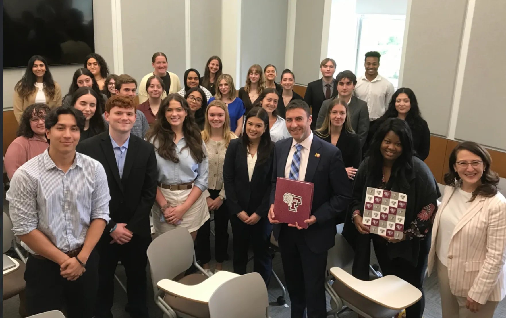 Council Member Eric Dinowitz with Fordham Gabelli students Keisha Shay CCEL and Aniko Delaney Gabelli.
