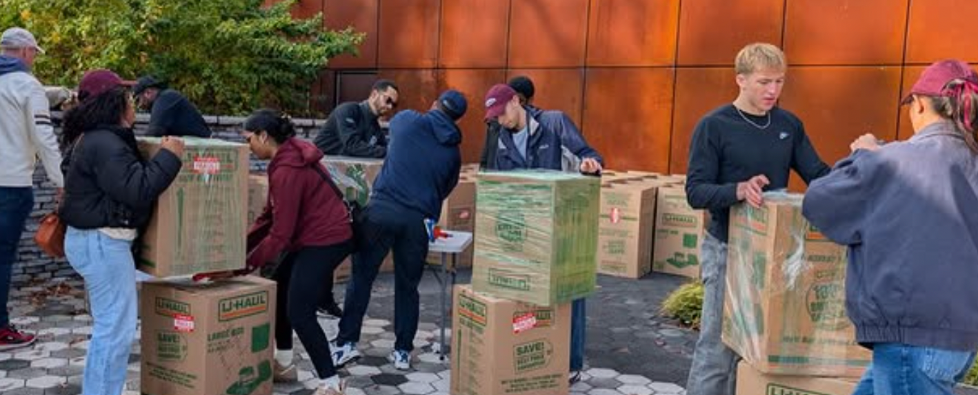Fordham students and staff at Jamaica Relief Event at YMCA