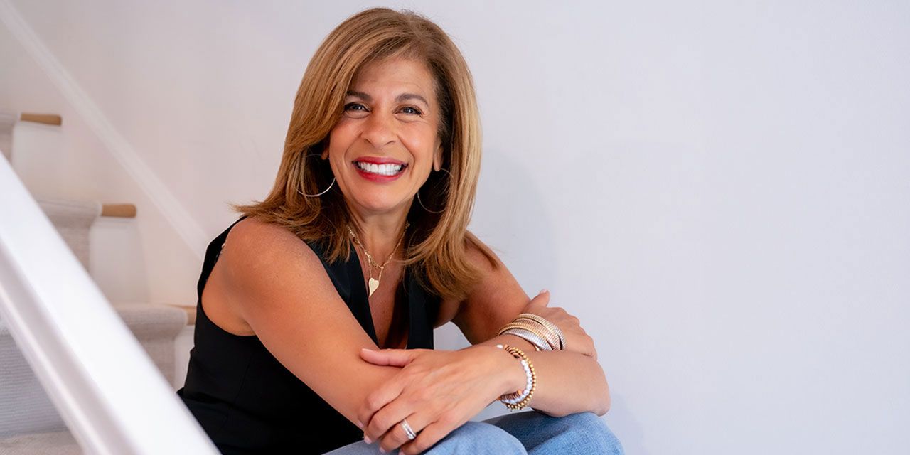 Hoda-Kotb sitting on steps