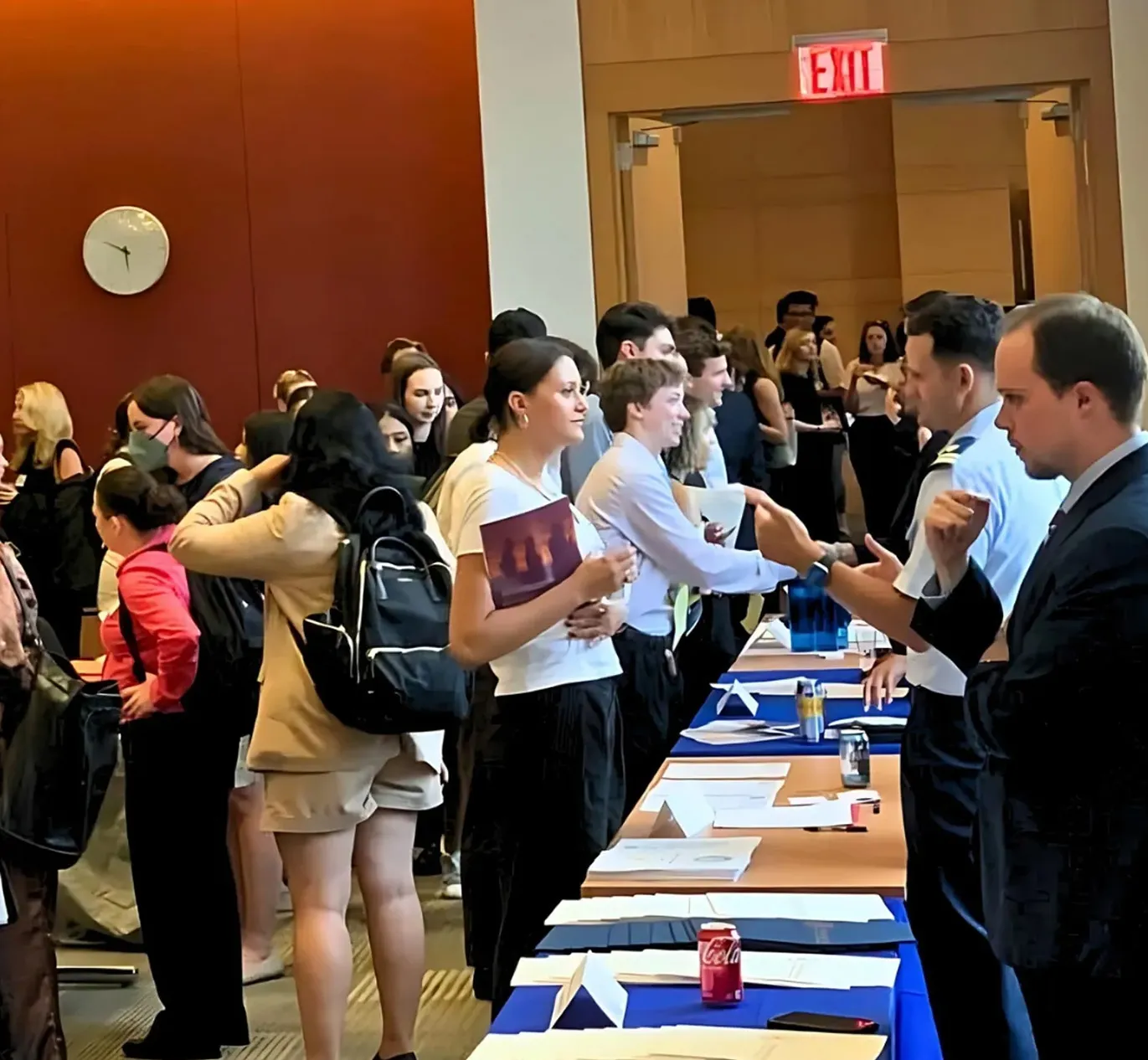 Professionals networking at a reception