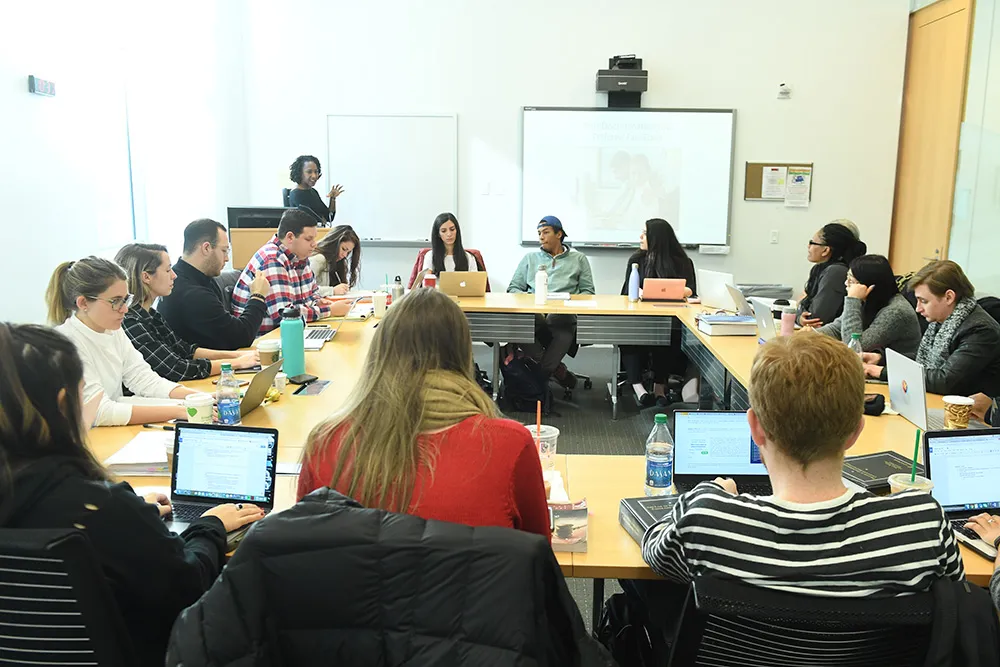 Prof Kimani Paul-Emile teaching in seminar room